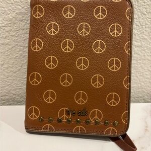 The Sak Tan Peace Sign Zip Wallet with Stud Accents